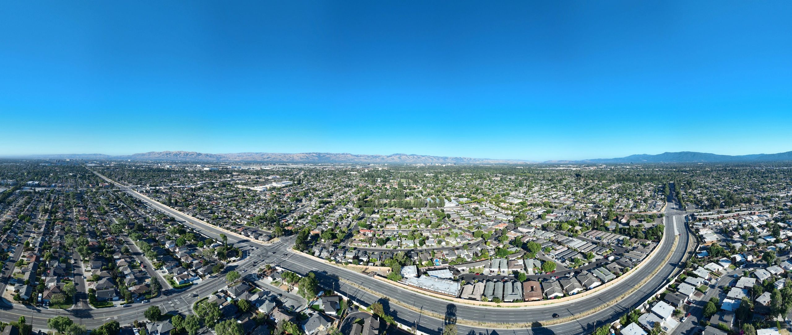 Aerial view of a neighborhood representing market reach