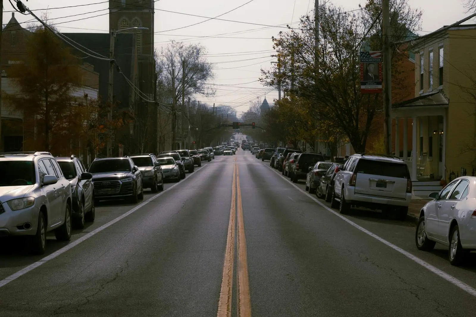 Residential neighborhood street in Prince George's County Maryland showing well-kept homes with front porches and green lawns
